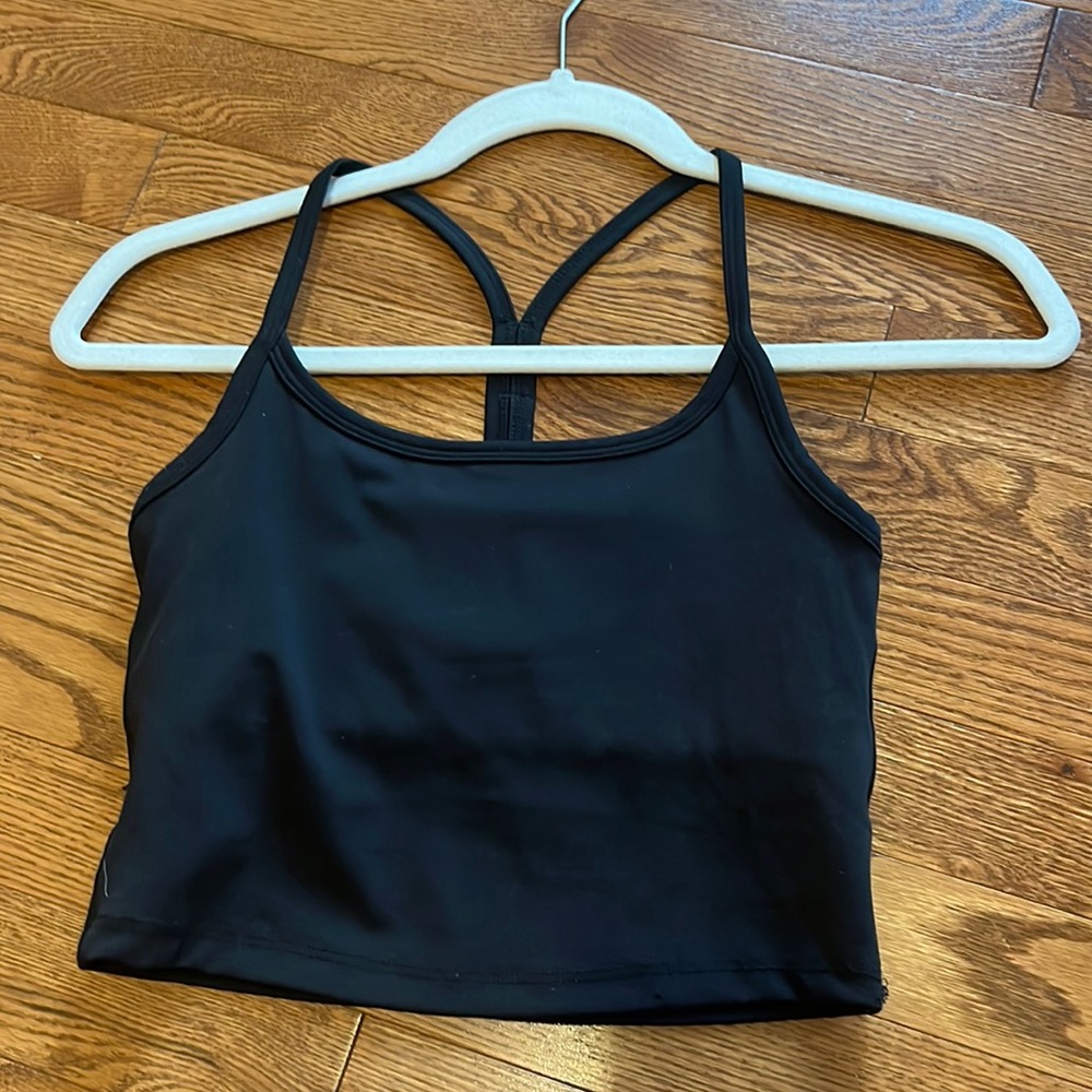 Black athletic cropped tank. Never worn.